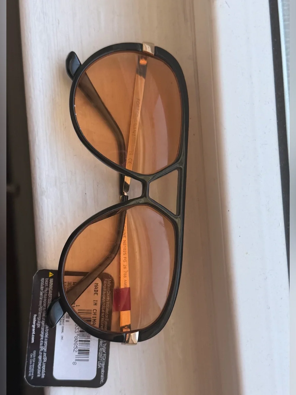 Foster Grant Black Frame Sunglasses with Amber Lenses and Gold Temples